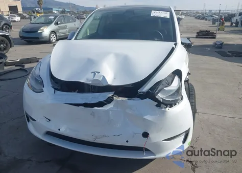 2022 Tesla Model Y Long Range Dual Motor All-Wheel Drive z USA, uszkodzony, nr VIN 7SAYGDEE0NF544844